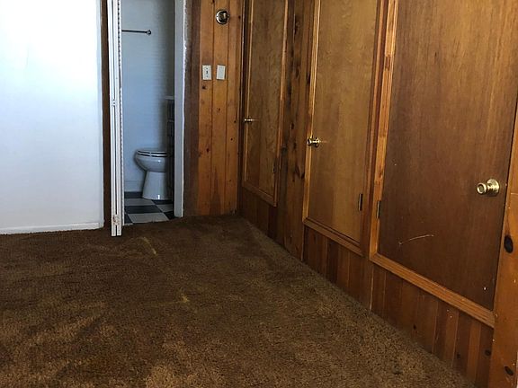 Spare bedroom, large closet with half-bath. This room includes W/D hookup.