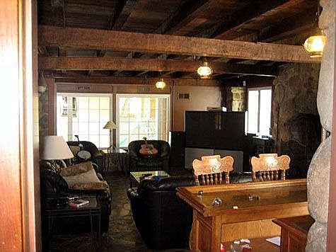 Timber ceiling and large windows adds to this wonderful Great room