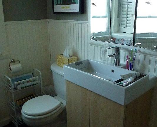Full bathroom with privacy-glass lower window