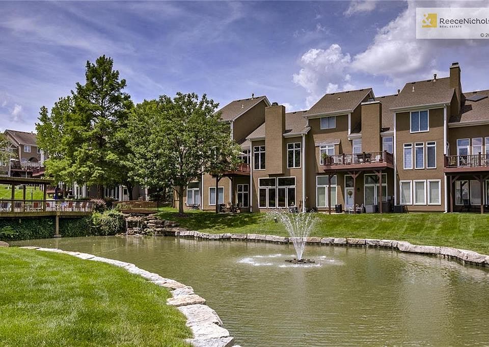 Spectacular View off of the deck to fountain, waterfall & community pool