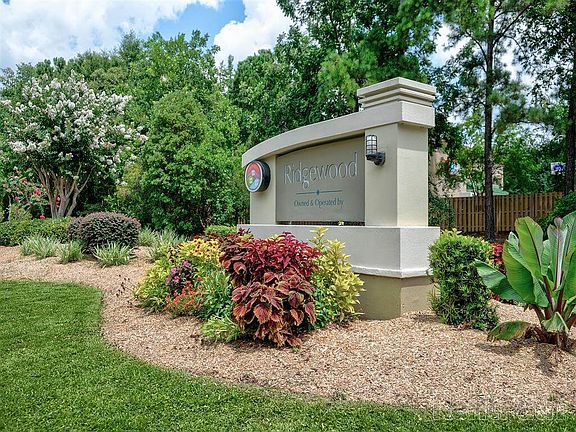 Ridgewood entrance with lush landscaping