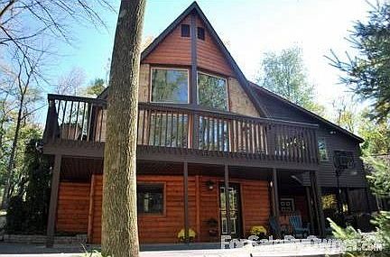 Front of House
						:
						faces gorgeous wooded setting