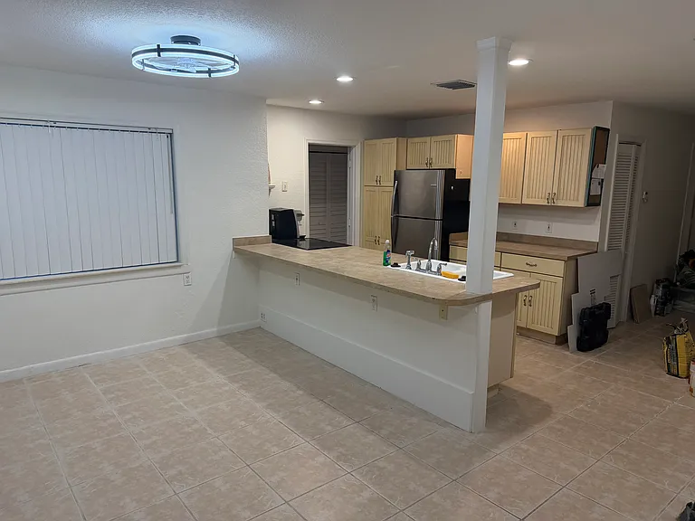 Dining room with Bluetooth light and fan 
Counter top bar/dining top