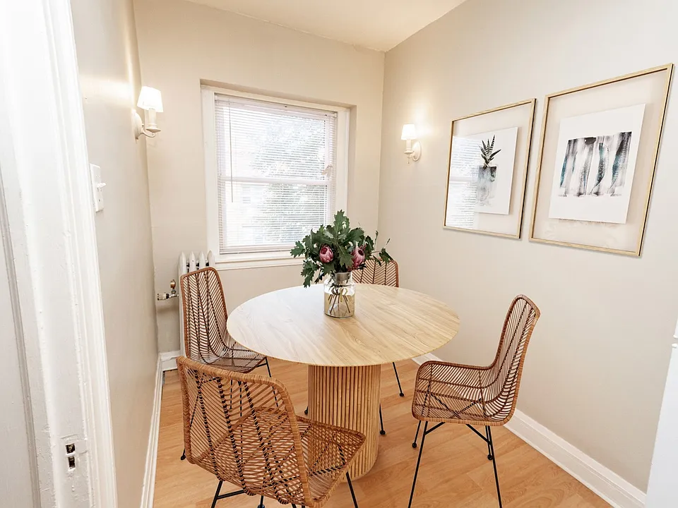Step into elegance at Central Lakes of Uptown. This inviting dining area features a stylish round table and modern decor, perfect for gatherings or quiet meals. Elevate your living experience today. Schedule a tour to see for yourself!