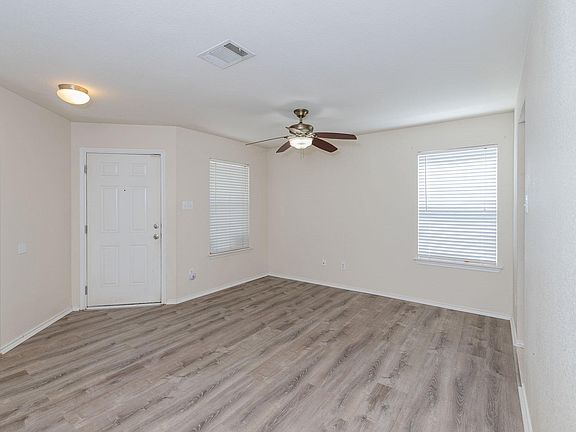 Inside looking at front door and front separate living area