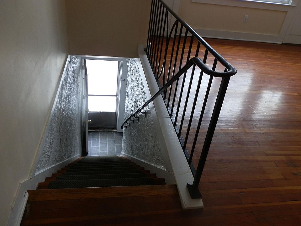 carpeted steps, tiled entry. private entrance with little hall