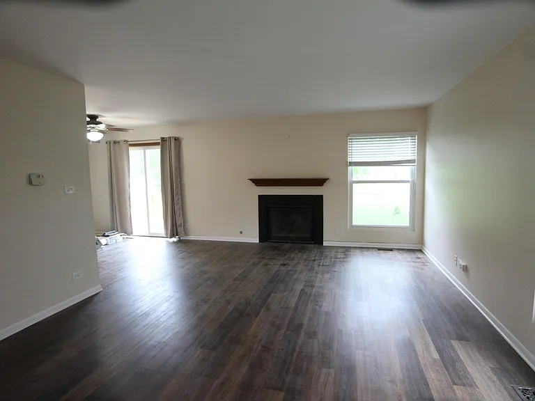 Living room with gas fireplace.