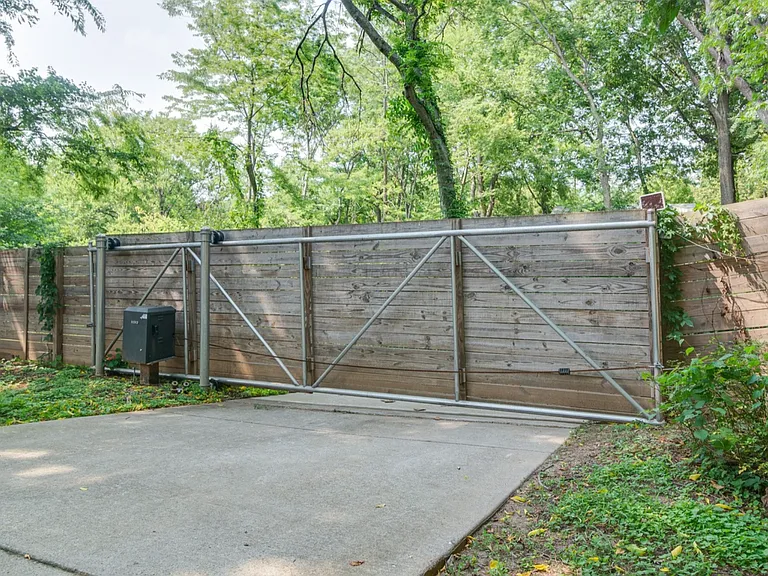 Private driveway with remote-controlled gate for easy and secure entry