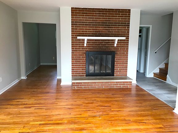 Living Room with brick fireplace