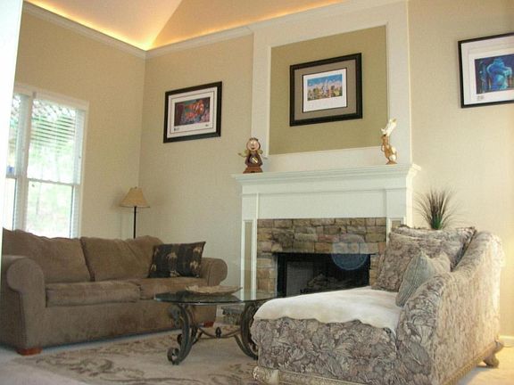 Cathedral Ceiling Family room with Stacked Stone Fireplace (Gas logs included)