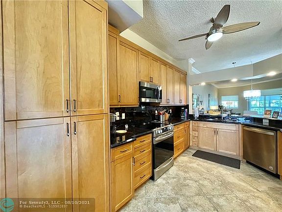 5th image of 7492 Granville Dr #413