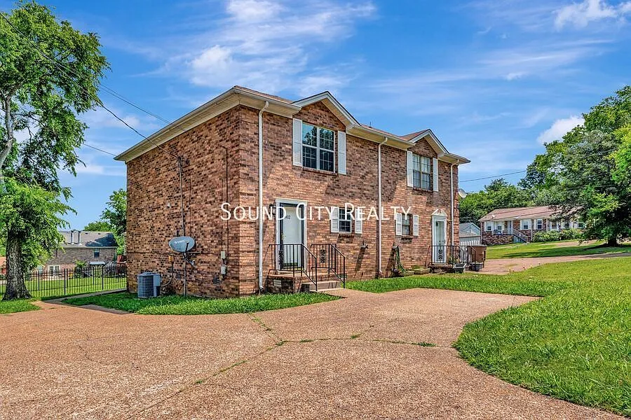 Townhome available now, recently renovated 2 bed/2.5 bath with deck, large living room — Photo 1