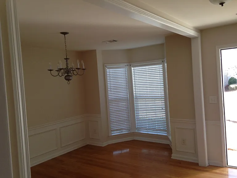 Dining Room view 2.
Please note: First-floor flooring was upgraded to beautiful, brand-new luxury vinyl flooring in late 2024. Updated flooring photos will be added soon. This applies to all first floor pictures.