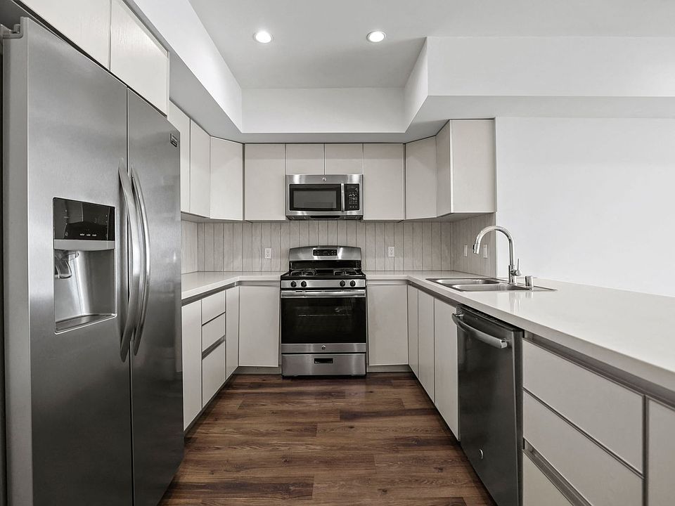 Large-Size Kitchen with Energy-Efficient Appliances and Ample Cabinet Storage