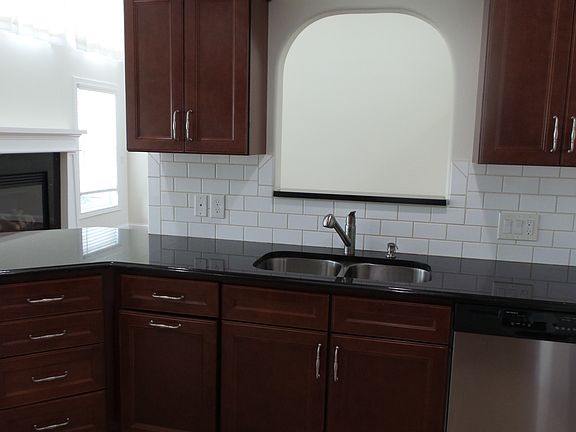 OPEN KITCHEN HAS GREAT FLOW.