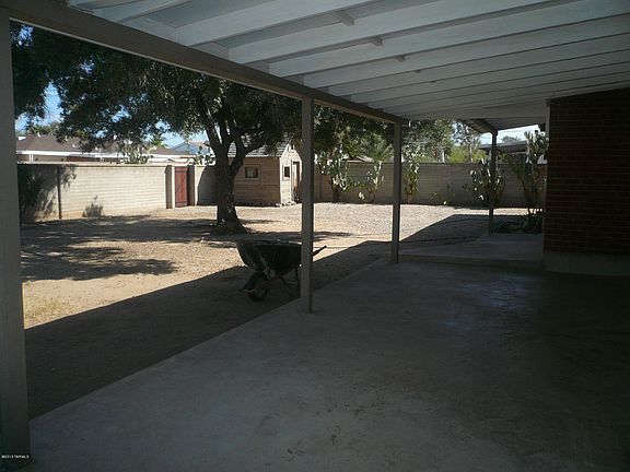 Large Covered Patio, large block wall enclosed backyard