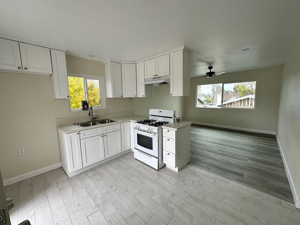 Kitchen and dinning room area with view of living room area