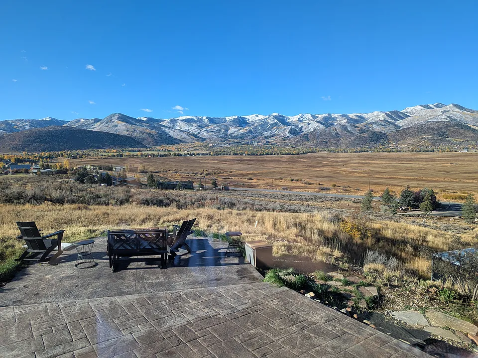 View from the backyard, ranging from Kimball Junction to Deer Valley. Lessor has occasional use of gas fire pit (shown) and hot-tub.