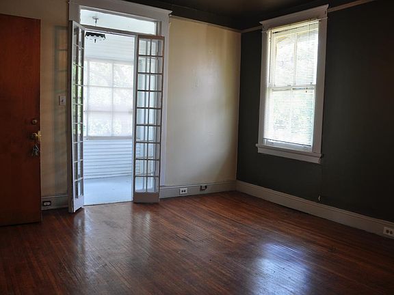 Beautiful front parlor opens up to the bonus room!