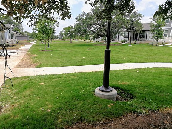 Great lawn in front the house for your kids and pets.