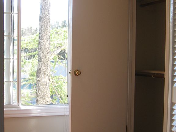 Closet in den with view of Mt. Tam