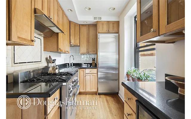 Sold by Douglas Elliman | media 13