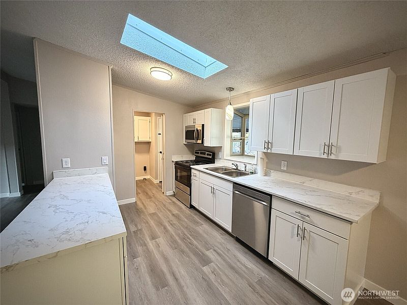 4th image of 11417 124TH Street Ct E #116