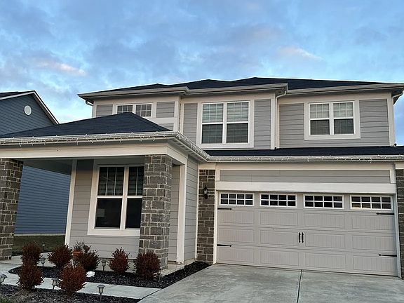 Front exterior view of the home, showcasing its welcoming curb appeal.