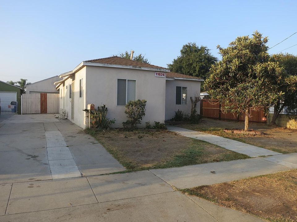 Front of the house with long driveway for additional vehicles