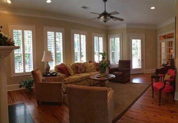Bright Sunshiny Family Room : with gas fireplace and hidden widescreen TV cabinetry