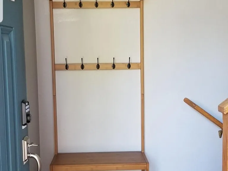 coat rack with shelves as you enter the front door.