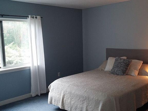 Large master bedroom with plenty of sunlight