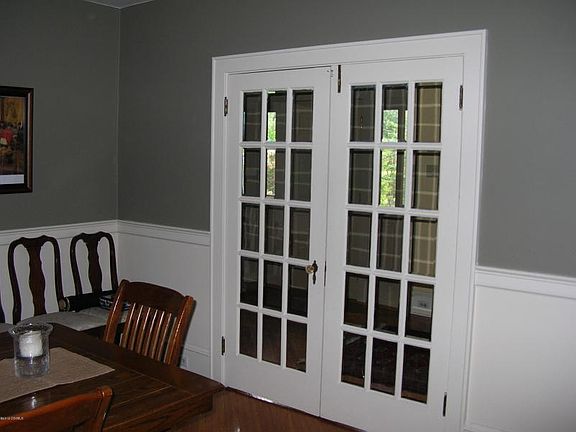 DINING ROOM #4 - GLASS DOOR KNOBS ADD TO THE HISTORIC ARCHITECTURE OF HOME