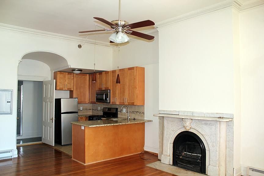 High Ceilings And Open Concept Kitchen!
