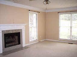 Spacious family room with gas starter fireplace