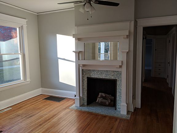 Fireplace from living room, unfurnished