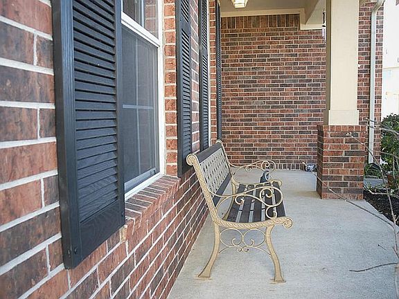 The front of this home has a charming covered front porch ready to be an inviting first impression to your new home!