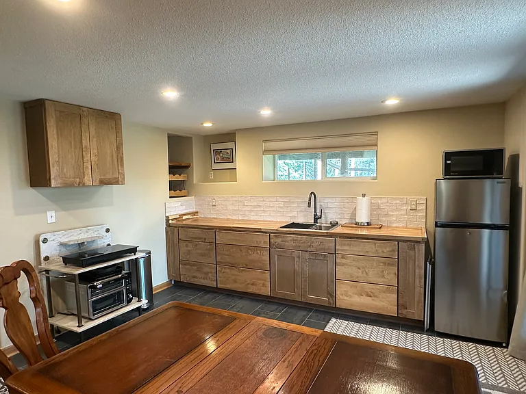 Functional kitchen with plug-in induction cooktop, small oven , refrigerator/freezer