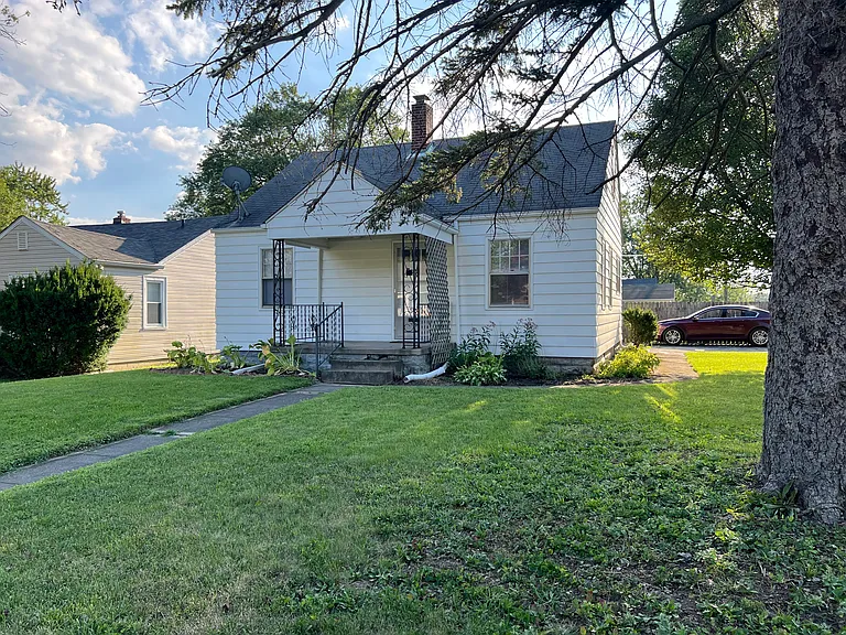 Front of the house & gardens.