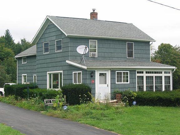 Paved driveway to home