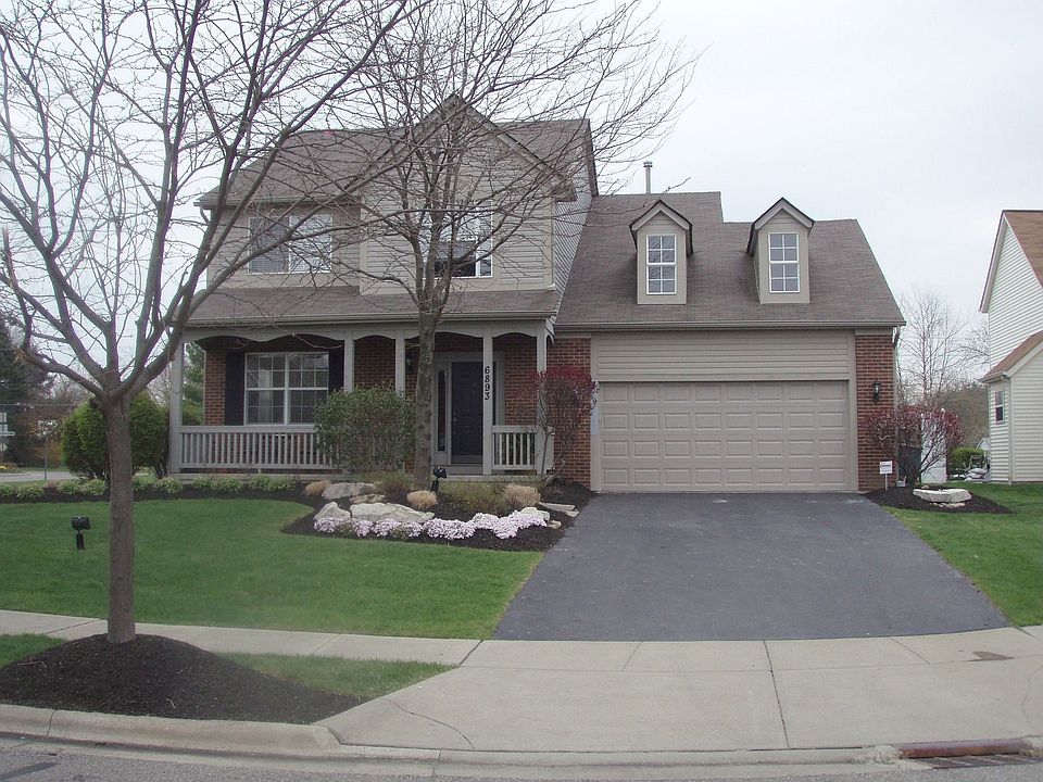 Spectatular prof. landscaped home w/3 car Gar & fenced yard.