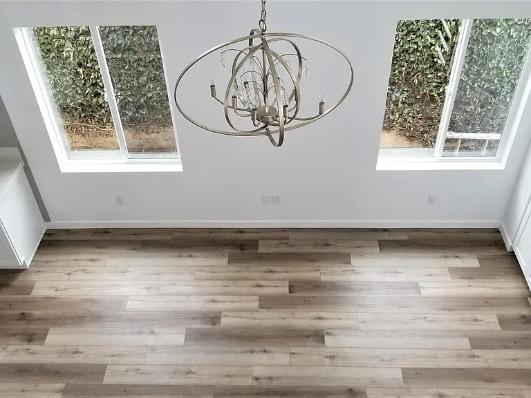 Double height living room. Large Windows