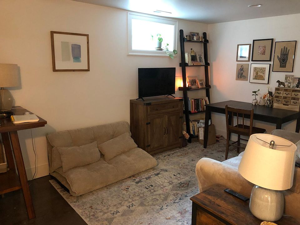 Living room area-will require a very small couch or one that comes apart (sectional) to get through the door with a quick job to go downstairs. *Note there is just one small window in the living area.