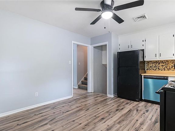 Kitchen , entry to upstairs and downstairs