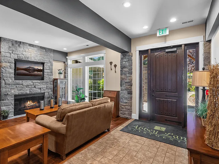 Cozy clubhouse lounge with fireplace.