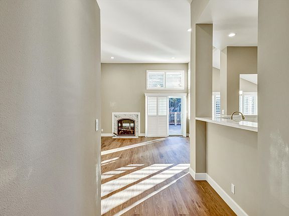 Hallway to Family Room, Kitchen, and Formal Dining Room