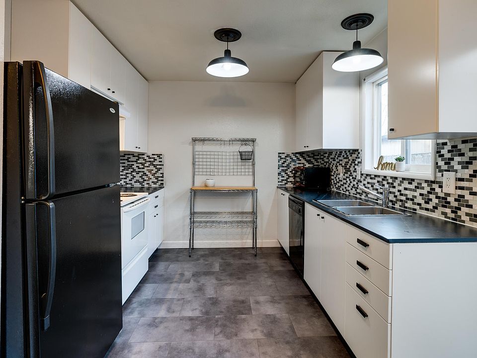 Newly remodeled kitchen: new lights, new cabinets, new tile, new floor