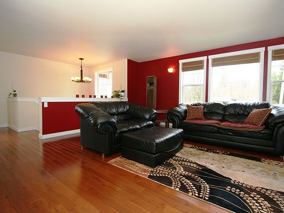 Living room with gleaming hardwoods