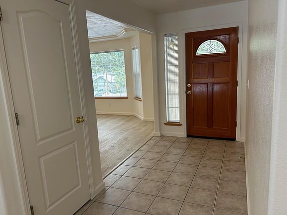 Entry and living room/home office area