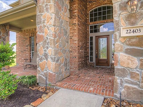 Fantastic front porch will allow you to enjoy the view of the lake across the street.